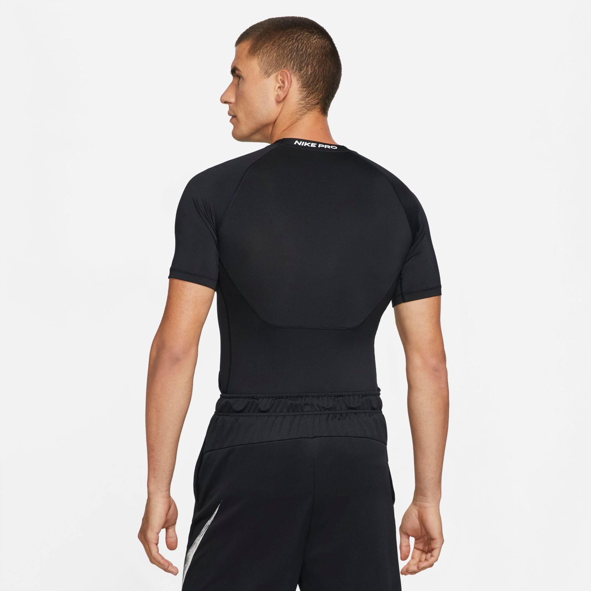 M NP DF TIGHT TOP SS 010 BLACK/WHITE 
